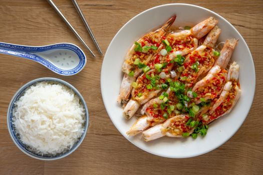 steam prawn with garlic and chilli on wooden background