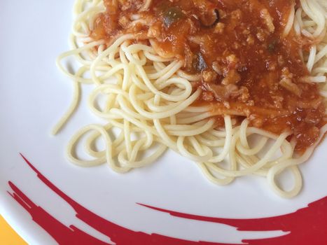 closeup spaghetti Bolognese with tomato sauce, copyspace