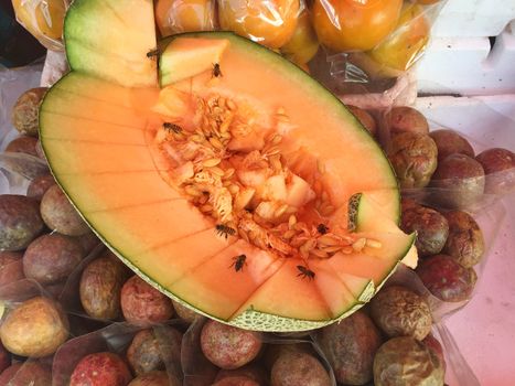 horizontal photo of Tibet melon with bees