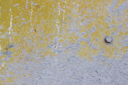 totally closeup yellow electric concrete mixer with wonderful texture background.