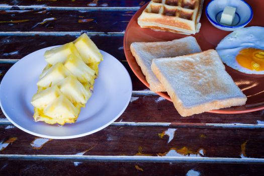 breakfast set of hotel in Thailand on wooden table