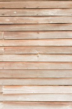 Old wooden texture of house wall, vertical photo