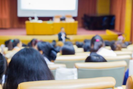 Abstract blurred photo background of conference hall or seminar room with attendee background