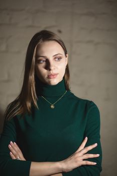 Portrait of beautiful fair young woman with fashion jewelry, one light source