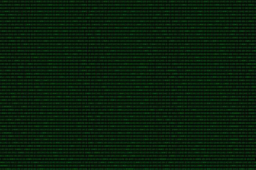 green binary computer code on black background