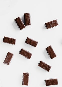 Dark chocolate candies isolated on white background, sweet food and tasty dessert