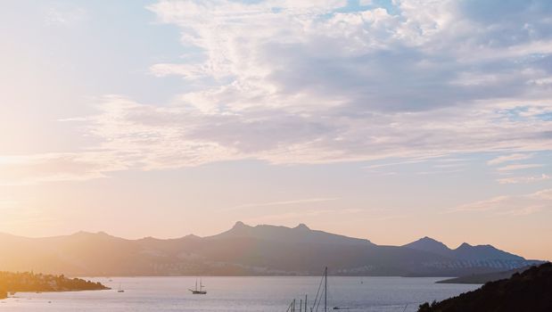 Beautiful sea view and mountains in the Mediterranean at sunset, summer vacation travel and holiday destination