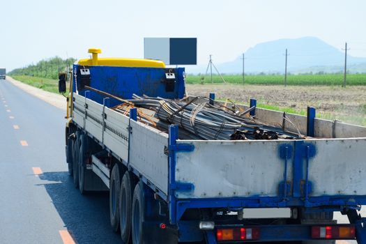 transportation of metal rental products in the back of a truck.