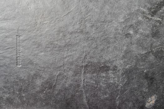 Background surface texture of an old book cover.