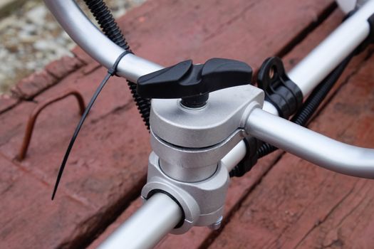 Fasteners for gas trimmer construction. Bolts and screws on the trimer body. Trimer gascosis with a leaf for mowing grass and shrubs.