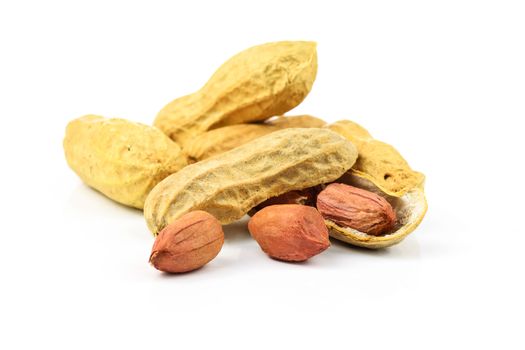 Dried peanuts isolated on the white background in close-up