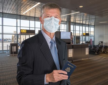 Mockup of airport terminal with casual senior adult holding passport and wearing mask against coronavirus