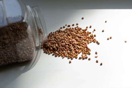 Buckwheat scattered from jars