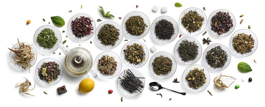 Large assortment of tea on a white background. The view from the top.