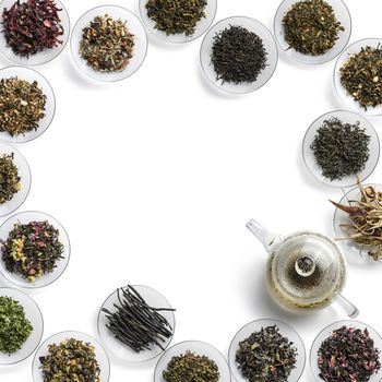 Large assortment of tea on a white background. The view from the top.