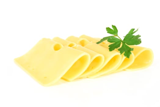 Pieces of fresh yellow cheese with parsley isolated on a white background in close-up