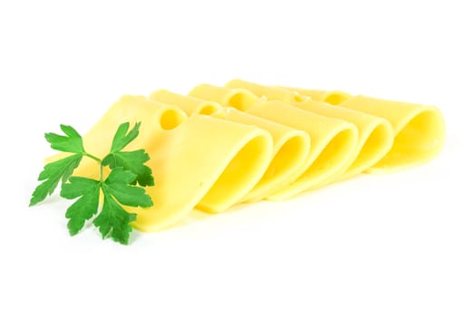 Pieces of fresh yellow cheese with parsley isolated on a white background in close-up.