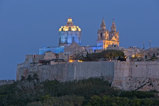 The medieval city of Mdina in Malta, at dusk.