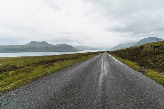 Landscape of mountains and a road in Scotland