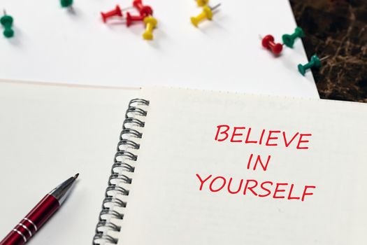 Motivational inspirational quote phrase Believe In Yourself. The concept of success.