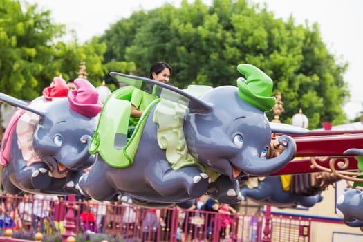 Lantau Island,Hong Kong,September 21 2015.Tourists are enjoying this ride called Dumbo the fly Elephant.