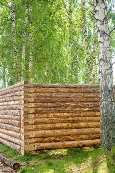 construction of a new wooden house, log cabin on summer