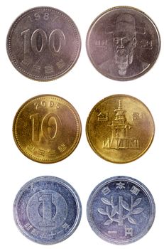 different old japanese coins isolated on white background