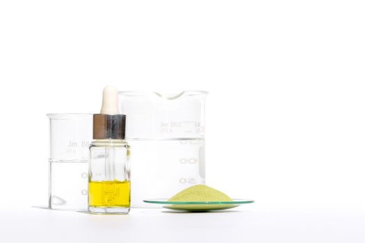 Cosmetic chemicals ingredient on white laboratory table. Emulsifier, Ethanolamine, Acid, Cetyl Alcohol