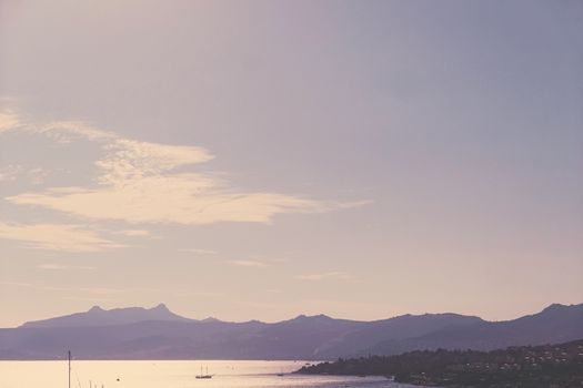 Beautiful sea view and mountains in the Mediterranean at sunset, summer vacation travel and holiday destination