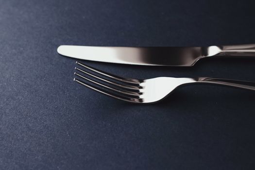 Fork and knife, silver cutlery for table decor, minimalistic design and diet concept
