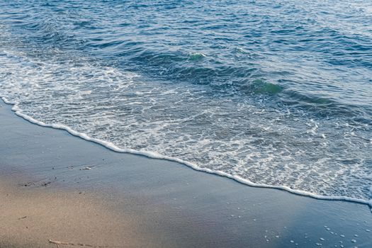 Beautiful sea or ocean waves, coast view from tropical sand beach, summer vacation travel and holiday destination scene