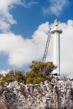 Lighthouse on rocky island, Cuba.