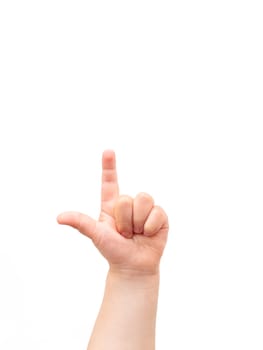 Child's hand on white background. The child points at something with his index finger. Flat lay, top view, copyspace.