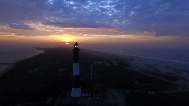 Aerial View of Sunrise at lighthouse on Long Island on a Spring Morning by a Drone