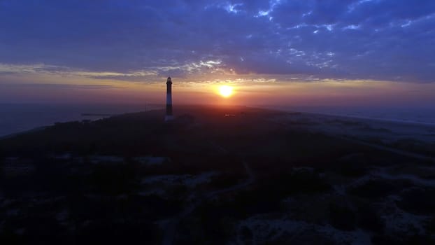 Aerial View of Sunrise at lighthouse on Long Island on a Spring Morning by a Drone