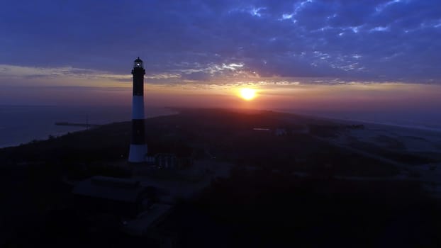 Aerial View of Sunrise at lighthouse on Long Island on a Spring Morning by a Drone