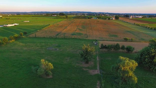 Aerial View of Amish Farm Countryside in Autumn from a Drone