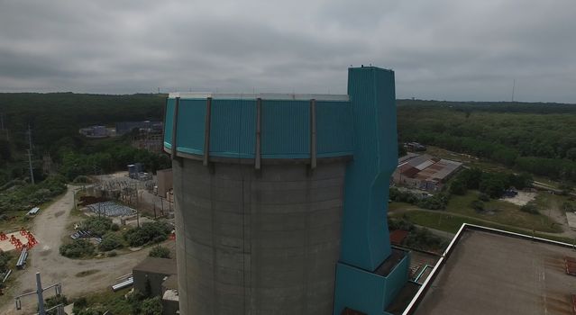 Aerial View of an Abandoned Nuclear Power Plant as Seen by a Drone on a Summer Day