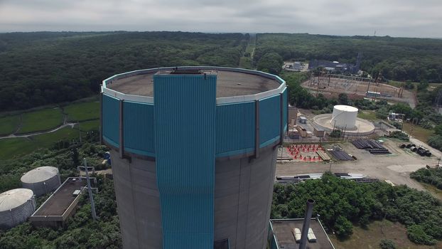 Aerial View of an Abandoned Nuclear Power Plant as Seen by a Drone on a Summer Day