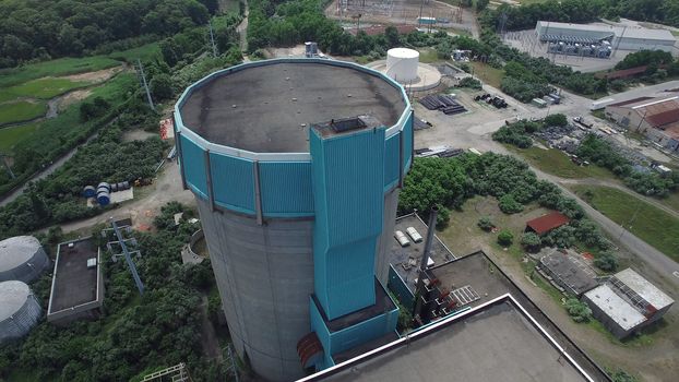 Aerial View of an Abandoned Nuclear Power Plant as Seen by a Drone on a Summer Day
