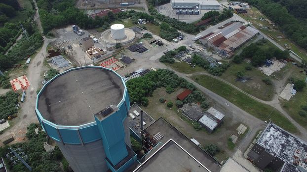Aerial View of an Abandoned Nuclear Power Plant as Seen by a Drone on a Summer Day