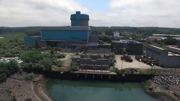 Aerial View of an Abandoned Nuclear Power Plant as Seen by a Drone on a Summer Day