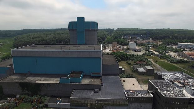 Aerial View of an Abandoned Nuclear Power Plant as Seen by a Drone on a Summer Day