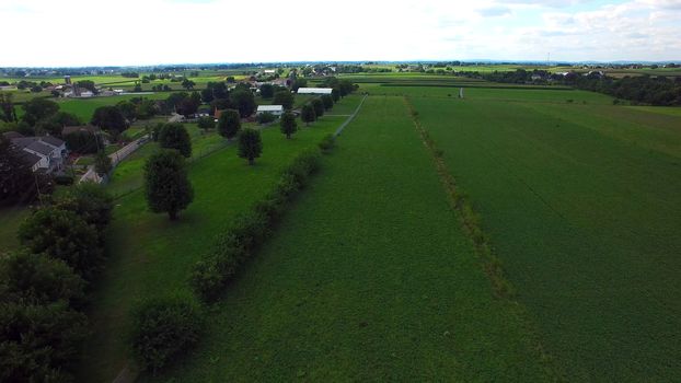 Aerial View of Amish Farm Countryside in Autumn from a Drone