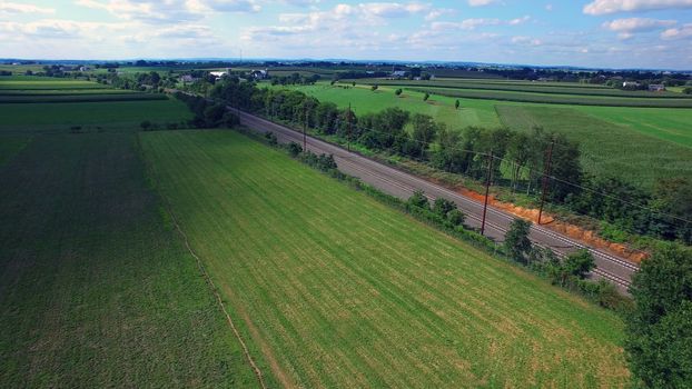 Aerial View of Amish Farm Countryside in Autumn from a Drone