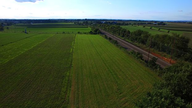 Aerial View of Amish Farm Countryside in Autumn from a Drone