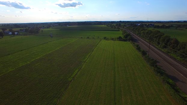 Aerial View of Amish Farm Countryside in Autumn from a Drone
