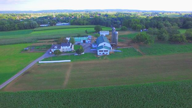 Aerial View of Amish Farm Countryside in Autumn from a Drone