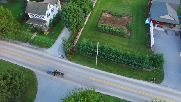 Aerial View of Amish Farm Countryside in Autumn from a Drone