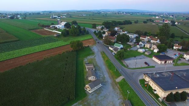 Aerial View of Amish Farm Countryside in Autumn from a Drone